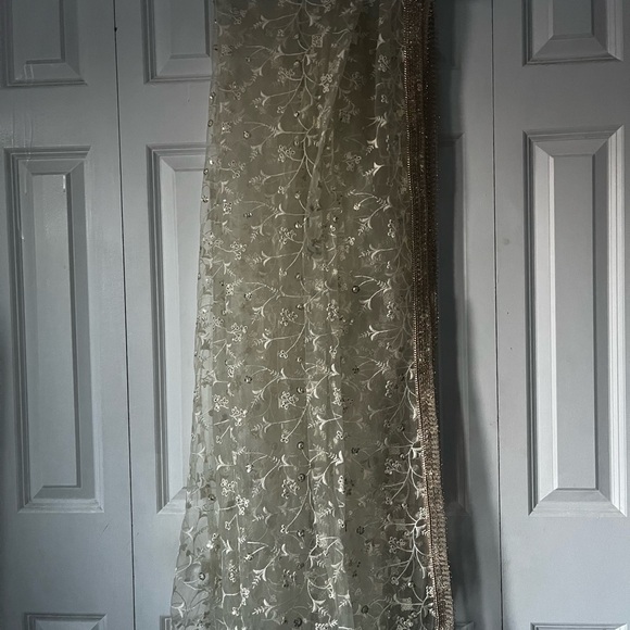 Turquoise Net Embroidered Lehenga Choli - Picture 7 of 9